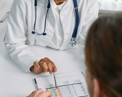 doctor explaining the chart to the patient