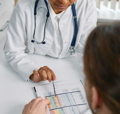 doctor explaining the chart to the patient