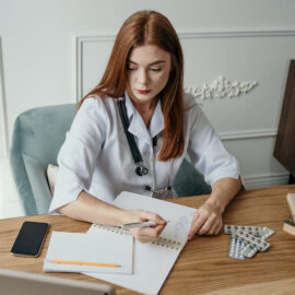 female doctor working at her desk