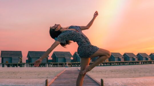 Happy woman on a dock