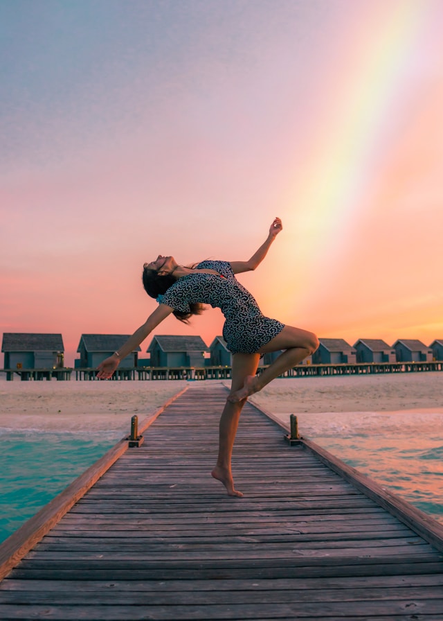 Happy woman on a dock