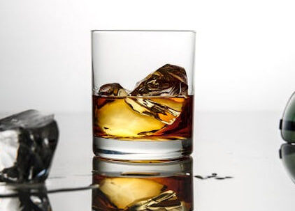 glass filled with alcohol