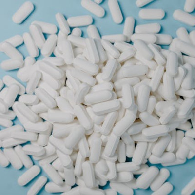 Pile of white long pills