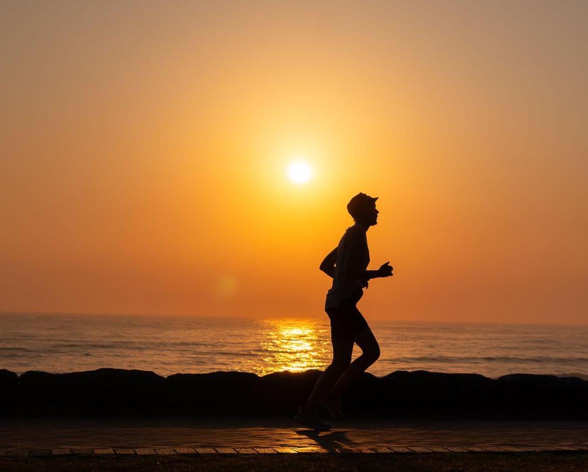 running-sunset Man running